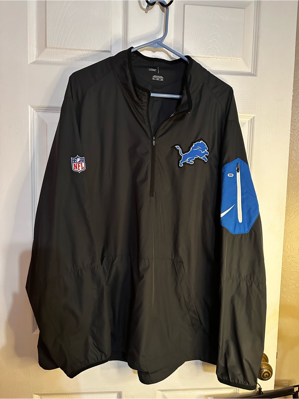 NFL Black and Blue Detroit Lions Quarter-Zip Windbreaker